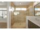 Luxurious bathroom featuring a glass-enclosed shower with stylish tile work and vanity at 1717 E Morten Ave # 2, Phoenix, AZ 85020