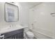Bathroom featuring a sleek vanity, modern fixtures, and a combined shower and tub at 1717 E Morten Ave # 2, Phoenix, AZ 85020