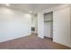 Bedroom with plush carpet and a closet with sliding doors at 1717 E Morten Ave # 2, Phoenix, AZ 85020