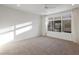 Bright bedroom with large window and neutral carpet, ready for personalization at 1717 E Morten Ave # 2, Phoenix, AZ 85020