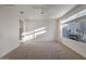 Large bedroom with natural light, neutral carpet, and a calming atmosphere at 1717 E Morten Ave # 2, Phoenix, AZ 85020