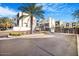 Gated community entrance with modern buildings and lush landscaping at 1717 E Morten Ave # 2, Phoenix, AZ 85020