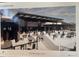Inviting outdoor patio with comfortable seating, perfect for dining and enjoying scenic views at the Hilton Resort at 1717 E Morten Ave # 2, Phoenix, AZ 85020