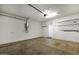 Spacious garage featuring ample storage space, a water heater, and access to the home at 1717 E Morten Ave # 2, Phoenix, AZ 85020