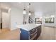 Open-concept living area with tile floors and a view of the interior courtyard at 1717 E Morten Ave # 2, Phoenix, AZ 85020