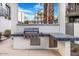 An outdoor grilling area features a built-in barbecue and ample counter space for food preparation at 1717 E Morten Ave # 2, Phoenix, AZ 85020