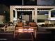Outdoor entertainment area featuring a covered kitchen with built-in grill and cozy seating area with fire pit at 1717 E Morten Ave # 2, Phoenix, AZ 85020
