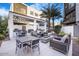An outdoor patio space features lounge seating, a fire pit, and a built-in grill area at 1717 E Morten Ave # 2, Phoenix, AZ 85020