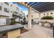 Outdoor kitchen and barbecue area, perfect for entertaining guests in a stylish and comfortable setting at 1717 E Morten Ave # 2, Phoenix, AZ 85020