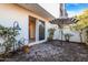 Private patio featuring brick pavers, shade umbrella, and access to the home's interior at 1717 E Morten Ave # 2, Phoenix, AZ 85020