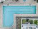 Aerial view of a community swimming pool with clean blue water and surrounding brick patio at 1717 E Morten Ave # 2, Phoenix, AZ 85020