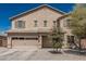 Charming two-story home featuring a neutral color scheme and a two-car garage at 25420 W Park Ave, Buckeye, AZ 85326