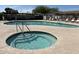 Relaxing community pool and hot tub with lounge chairs for residents at 305 S Val Vista Dr # 169, Mesa, AZ 85204