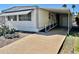 Welcoming single-story home with covered parking and easy access ramp, perfect for convenient living at 305 S Val Vista Dr # 169, Mesa, AZ 85204