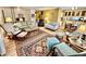 Spacious living room with comfortable seating, hardwood floors, and open layout perfect for entertaining at 305 S Val Vista Dr # 169, Mesa, AZ 85204