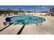 Community pool with lifeguard chair and lounge chairs at 305 S Val Vista Dr # 169, Mesa, AZ 85204