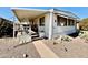 Relaxing porch with outdoor seating, providing a comfortable and inviting space to unwind at 305 S Val Vista Dr # 169, Mesa, AZ 85204