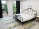 Serene bedroom with large windows, natural light, and stylish decor at 3229 E Malapai Dr, Phoenix, AZ 85028
