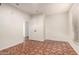 Inviting bedroom with terracotta tile flooring and natural light at 3229 E Malapai Dr, Phoenix, AZ 85028