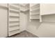 Spacious walk-in closet with built-in shelving for ample storage at 3229 E Malapai Dr, Phoenix, AZ 85028
