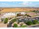 Aerial view of the local school providing convenient access for families within the community at 36020 W San Ildefanso Ave, Maricopa, AZ 85138