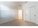 Bedroom featuring carpet and a sliding door closet at 3653 E Sweetclover Ln, San Tan Valley, AZ 85140