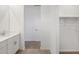 Bathroom featuring a vanity with sink, view to toilet, and closet at 3732 S 87Th Dr, Tolleson, AZ 85353
