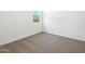 Bedroom with neutral carpet and window offering natural light at 3732 S 87Th Dr, Tolleson, AZ 85353