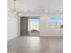 Open concept dining area with tile flooring and sliding glass door access to backyard at 3732 S 87Th Dr, Tolleson, AZ 85353