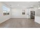 Large living area features tile floors and natural lighting at 3732 S 87Th Dr, Tolleson, AZ 85353