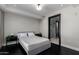 Well-lit bedroom featuring a comfortable queen-size bed and en-suite bathroom at 4422 N 75Th St # 6007, Scottsdale, AZ 85251
