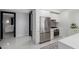 Modern kitchen featuring stainless steel appliances, white cabinetry, and sleek countertops at 4422 N 75Th St # 6007, Scottsdale, AZ 85251