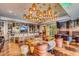 Stylish resident lounge with elegant lighting, modern seating, and a fully equipped bar at 4422 N 75Th St # 6007, Scottsdale, AZ 85251