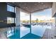 Inviting indoor/outdoor pool with deck lounge area, modern design, and inviting blue waters at 4422 N 75Th St # 6007, Scottsdale, AZ 85251