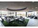 Stylish poolside lounge area featuring modern outdoor seating and a covered terrace at 4422 N 75Th St # 6007, Scottsdale, AZ 85251