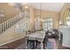 Spacious dining room featuring high ceilings, stairs, and a stylish chandelier at 4514 E Coyote Wash Dr, Cave Creek, AZ 85331