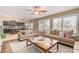 Bright living room area with views into the kitchen, hardwood floors and lots of natural light at 4514 E Coyote Wash Dr, Cave Creek, AZ 85331