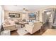 Comfortable living room with hardwood floors, plush sofas, and a built-in entertainment center at 4514 E Coyote Wash Dr, Cave Creek, AZ 85331