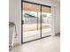 Sliding glass doors open onto the backyard, and there's a small concrete patio at 6031 W Hearn Rd, Glendale, AZ 85306