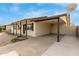 Single-story home featuring a convenient attached carport at 6031 W Hearn Rd, Glendale, AZ 85306