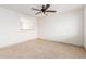 Spacious living room featuring tile flooring and lots of natural light at 6031 W Hearn Rd, Glendale, AZ 85306
