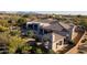 Aerial view showcasing the home, pool, outdoor kitchen, and landscaped backyard at 6240 E Ironwood Dr, Scottsdale, AZ 85266