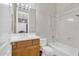 Bathroom features a tub and shower, sink, and a view into an adjacent room at 6240 E Ironwood Dr, Scottsdale, AZ 85266