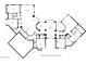 Detailed floor plan showcasing spacious layout, including bedrooms, kitchen, living areas, and garage at 6240 E Ironwood Dr, Scottsdale, AZ 85266