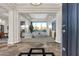 Inviting living room with large windows, stylish tile flooring, and abundant natural light at 6240 E Ironwood Dr, Scottsdale, AZ 85266