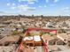 Aerial view of property showcasing desert landscape, neighborhood layout, and defined property lines at 640 E Desert Canyon Rd, Wickenburg, AZ 85390