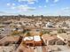 Aerial view of neighborhood featuring desert landscape, various residential homes, and quiet streets at 640 E Desert Canyon Rd, Wickenburg, AZ 85390