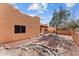 The private backyard offers low-maintenance desert landscaping with a covered patio area and ample space at 640 E Desert Canyon Rd, Wickenburg, AZ 85390