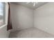 Bright bedroom with carpet and a large window at 640 E Desert Canyon Rd, Wickenburg, AZ 85390