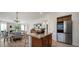 Kitchen island with view into the dining and living area at 6822 S Rachael Way, Gilbert, AZ 85298